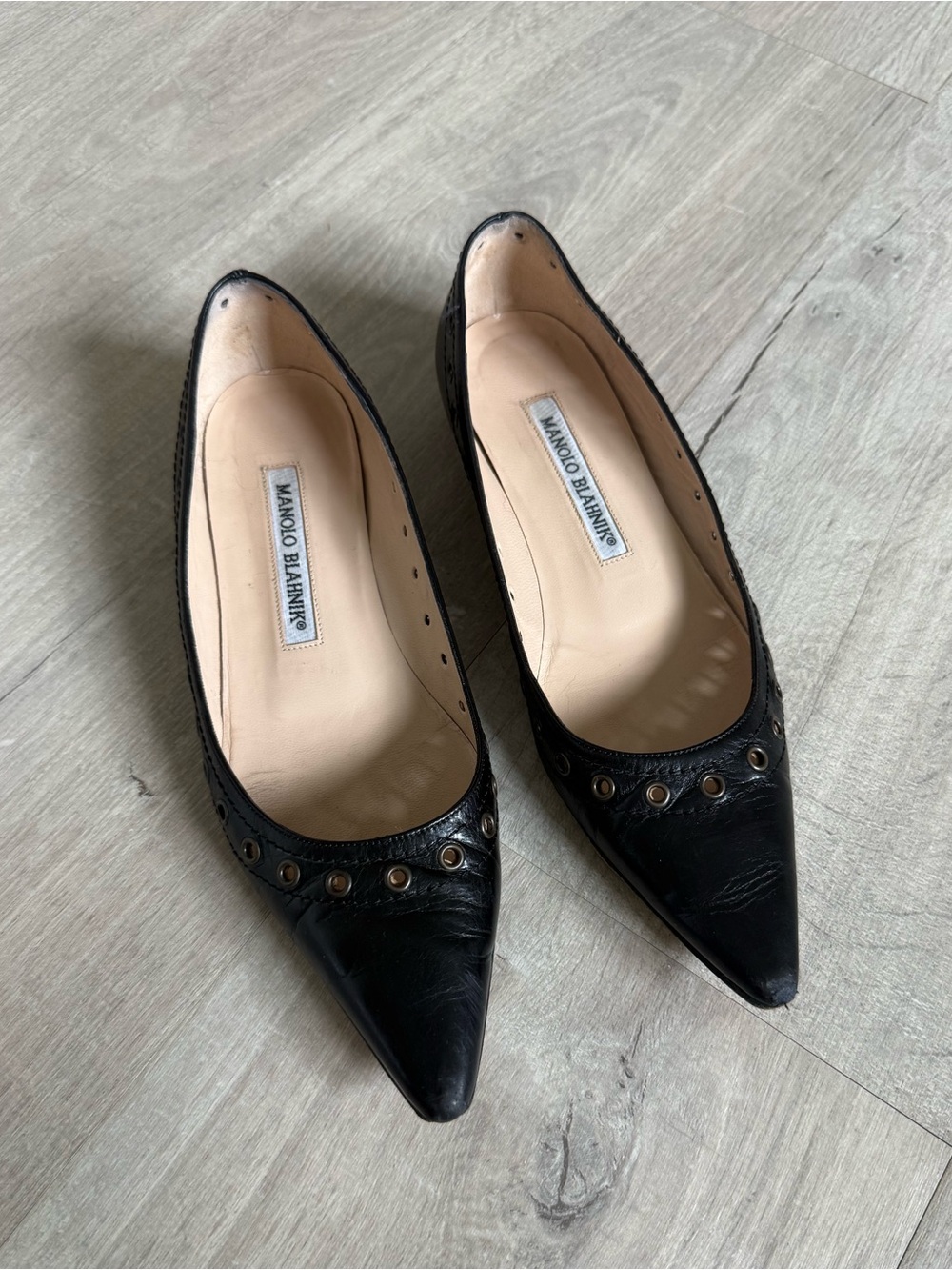 Manolo Blahnik Black Pointed-Toe Leather Flats with Eyelet Detail